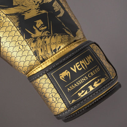 Venum Boxhandschuhe X Assassins Creed Shadows, schwarz-gold